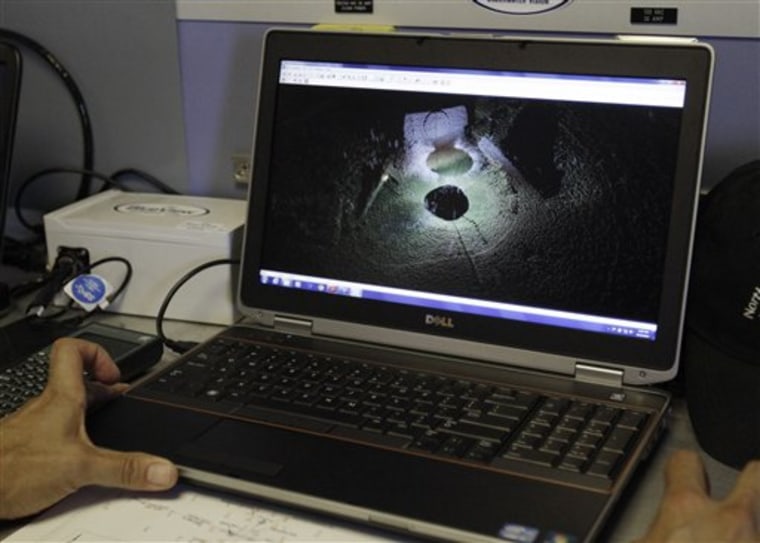 A sonar image of the wreckage of the USS Hatteras emerges on a computer screen as part of a mapping expedition in the Gulf of Mexico off the Texas coast on Monday. The Hatteras was sunk in 1863 during a battle with a Confederate ship, the CSS Alabama.